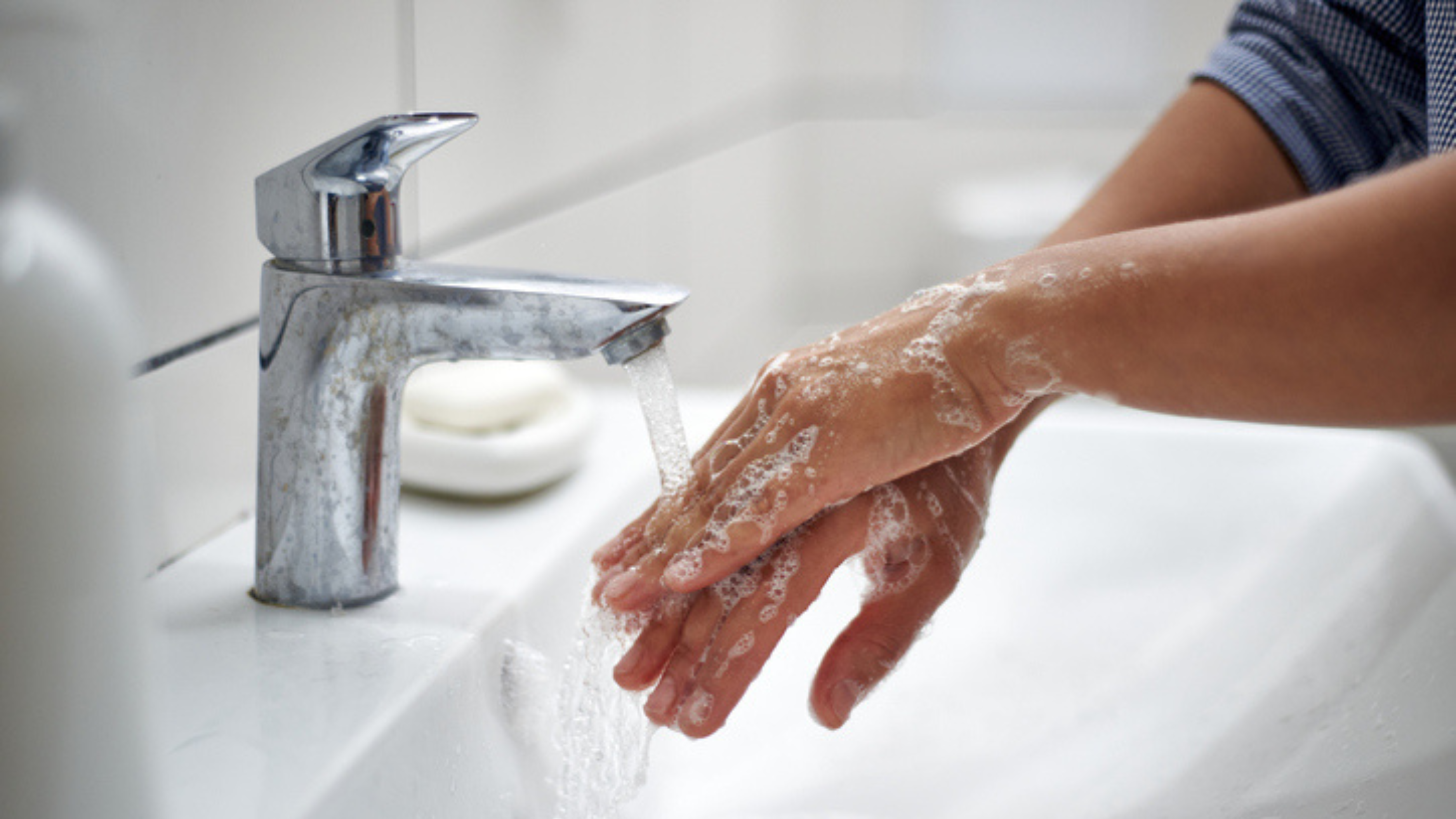 someone washes his hands